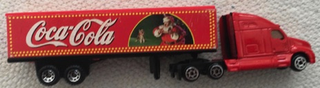 10147-2 € 5,00 coca cola vrachtwagen kerstman met hondje 15 cm.jpeg